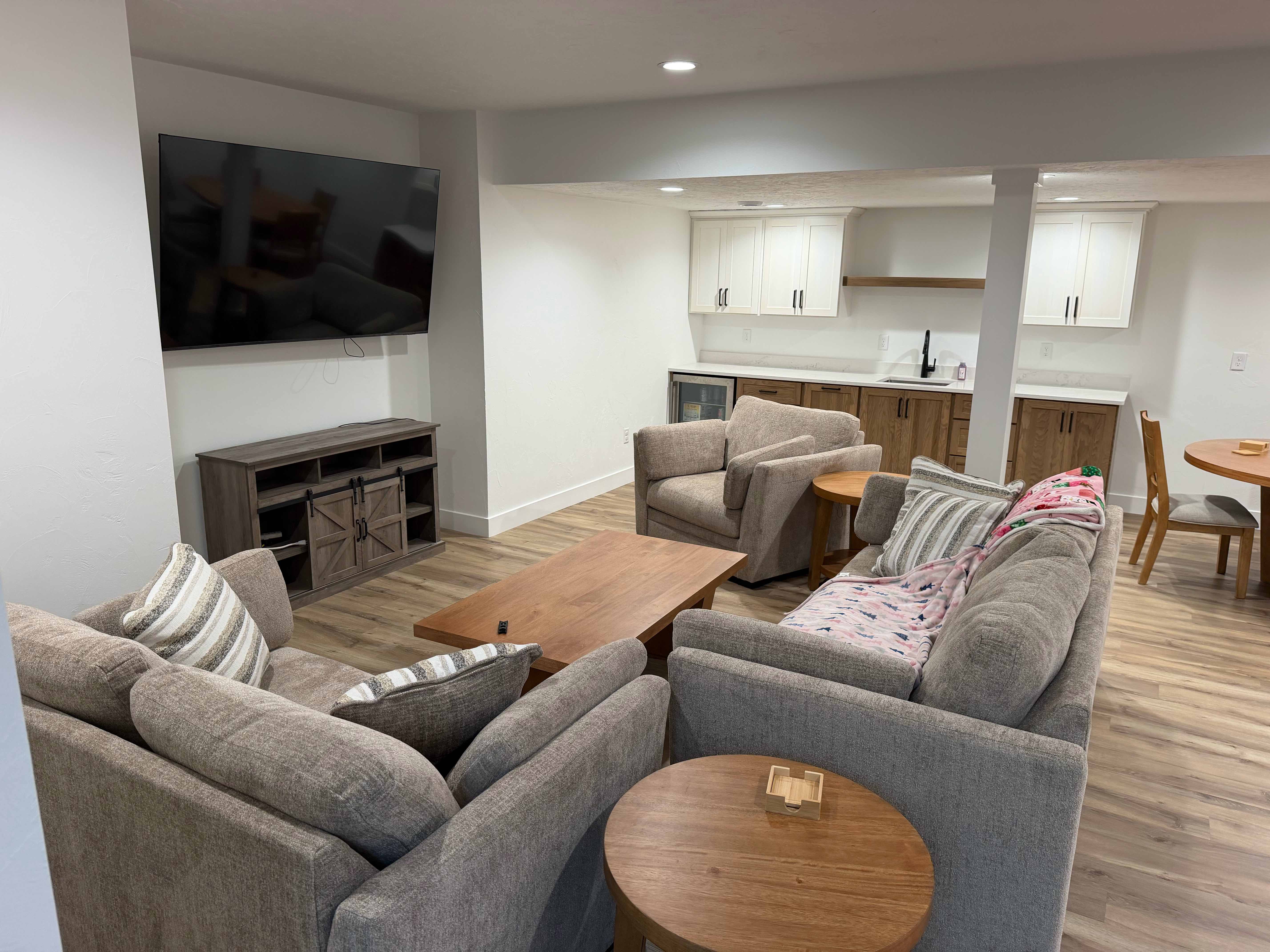 Finished Basement Family Room with Vinyl Plank Flooring